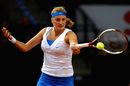 Petra Kvitova plays a forehand in her match against Francesca Schiavone