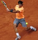 Rafael Nadal returns the ball to Guillermo Garcia-Lopez