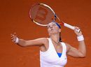 Petra Kvitova serves in her match against Francesca Schiavone