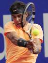 Rafael Nadal blasts a backhand return