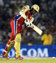 Chris Gayle thumps the ball down the ground