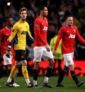 Patrice Evra, David De Gea, Chris Smalling and Wayne Rooney look dejected