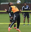 Didier Drogba controls a ball during a training session