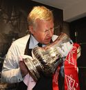 Kevin Williams cleans the FA Cup trophy