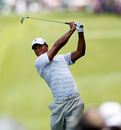 Tiger Woods keeps a keen eye on his shot