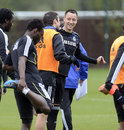 John Terry shares a joke with Frank Lampard during a Chelsea training session