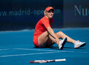 Caroline Wozniacki clutches her ankle