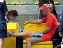 Caroline Wozniacki receives treatment on her ankle