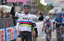 Mark Cavendish celebrates as he crosses the line