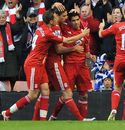 Luis Suarez celebrates after scoring the opening goal