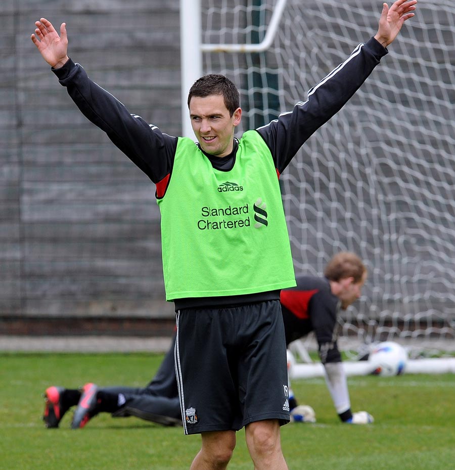 Stewart Downing celebrates during a training session