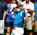 Rory McIlroy reacts on a tough day