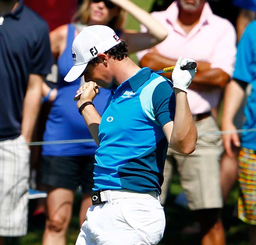 Rory McIlroy reacts on a tough day