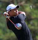 Tiger Woods powers through a drive