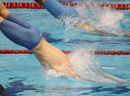 Paul Biedermann dives into the pool at the start of the men's 100m freestyle