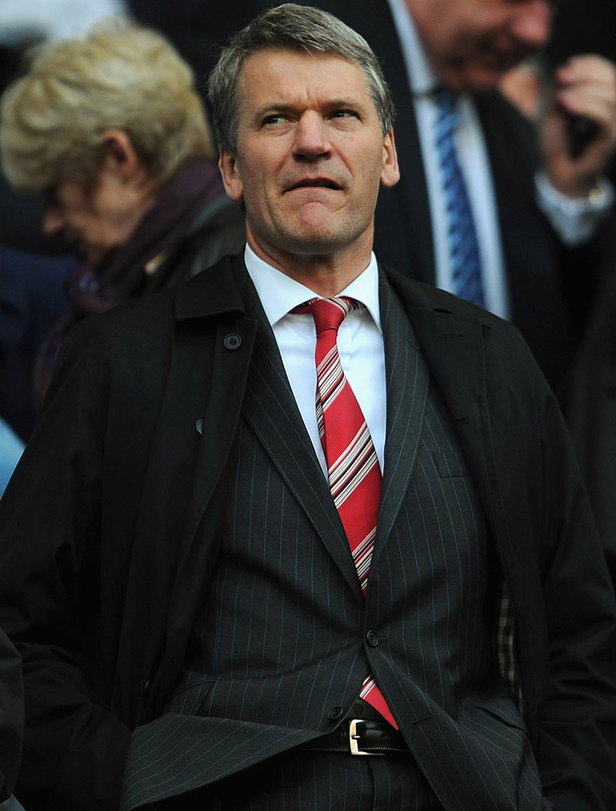 Manchester United chief executive David Gill watches on