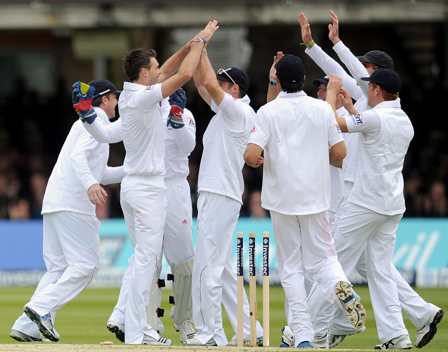 England celebrate their first wicket of the season