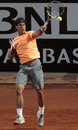 Rafael Nadal powers into a forehand