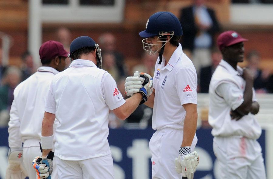 Alastair Cook is congratulated by Ian Bell