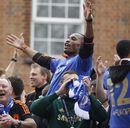 Didier Drogba celebrates winning the Champions League during a parade