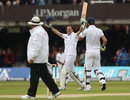 Kevin Pietersen runs to celebrate with Andrew Strauss 