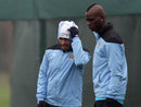 Carlos Tevez and Mario Balotelli take part in a training session