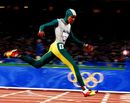 Cathy Freeman crosses the finishing line to win gold
