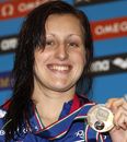 Sophie Allen displays the silver medal she won in the women's 200 meter individual medley 