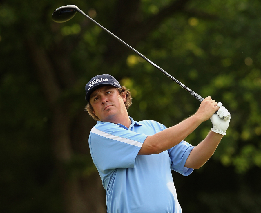 Jason Dufner watches the ball