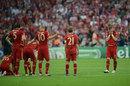 Bastian Schweinsteiger cuts a dejected figure after missing his penalty