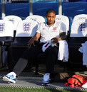 Glen Johnson watches from the dugout