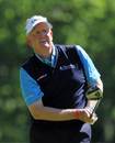 Colin Montgomerie nervously watches his tee shot