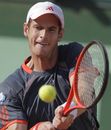 Andy Murray focuses on the ball against Tatsuma Ito 