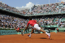 Rafael Nadal stretches for a return