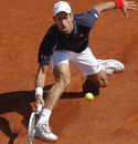 Novak Djokovic returns against Blaz Kavcic 