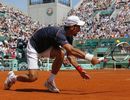 Novak Djokovic hits a return to Blaz Kavcic