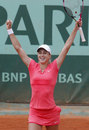 Petra Martic celebrates her win over Marion Bartoli