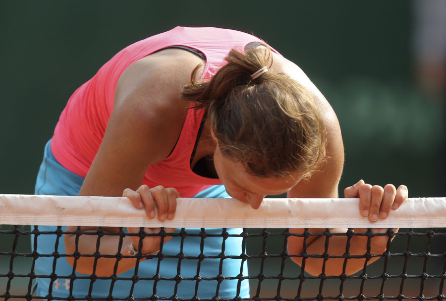 Varvara Lepchenko kisses the net after beating Jelena Jankovic