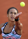 Heather Watson tosses up before serving