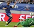 Karim Benzema chips the goalkeeper
