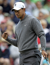Tiger Woods celebrates a birdie