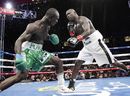 Antonio Tarver and Lateef Kayode exchange punches