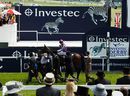 Joseph O'Brien celebrates after winning the Investec Derby aboard Camelot
