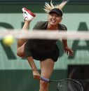 Maria Sharapova rifles down a serve
