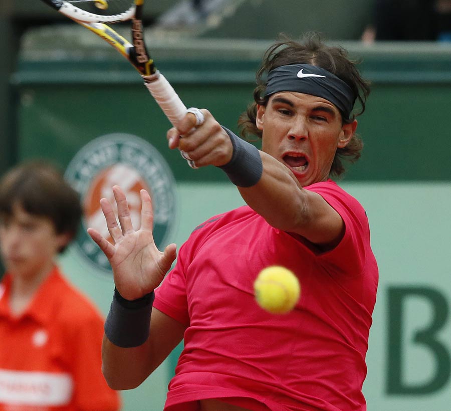 Rafael Nadal puts some topspin on the ball
