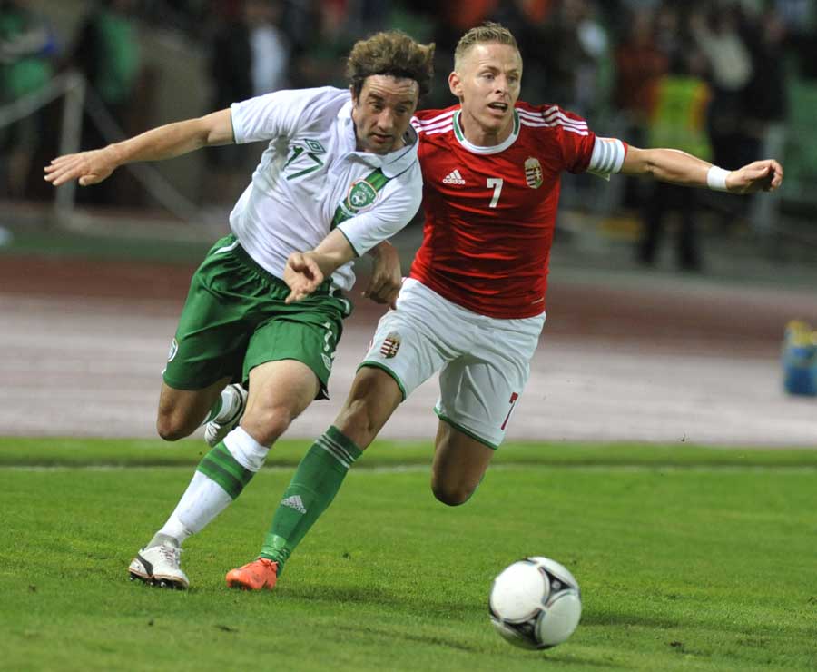 Ireland's Stephen Hunt and Hungary's Balazs Dzsudzsak run for the ball
