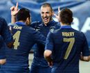 Karim Benzema is congratulated by Adil Rami and Franck Ribery