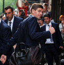 Steven Gerrard makes his way inside the team hotel