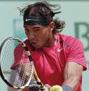 Rafael Nadal smashes a return