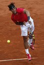 Rafael Nadal powers down a serve